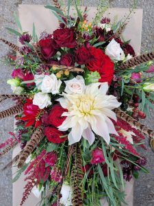 bridal flowers winter blooms and pheasant feathers 
